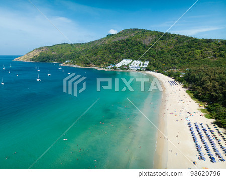 Wide angle view Nai Harn beach at phuket island on January 26-2023, Beautiful beach in thailand, Amazing High angle view sea in phuket Island with blue sky cloudy background, Travel holiday Concept 98620796