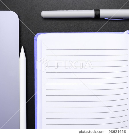 Different Office Supplies, Colored Stickers, Notebooks. Pens, Pencils, Rullers, Marckers. Different School Items. Important information. Accessories lying on desk. 98621638