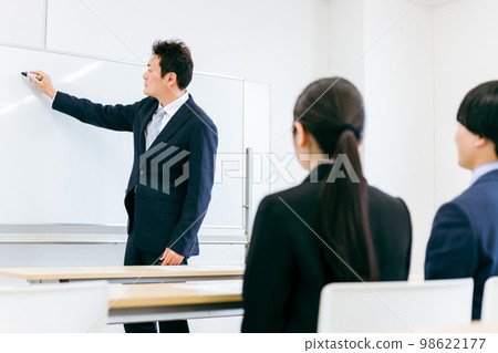 Boss, businessman, teacher, teacher, lecturer Asian man who conducts training, cram school, lecture, course, seminar in conference room, classroom Boss, businessman, teacher, teacher, lecturer Asian man who conducts training, cram school, lecture, course, seminar in conference room, classroom 98622177