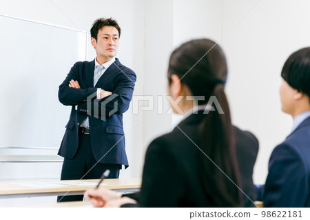 Boss, businessman, teacher, teacher, lecturer Asian man who conducts training, cram school, lecture, course, seminar in conference room, classroom Boss, businessman, teacher, teacher, lecturer Asian man who conducts training, cram school, lecture, course, seminar in conference room, classroom 98622181