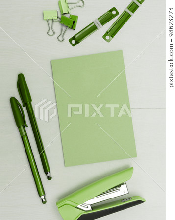 Different Office Supplies, Colored Stickers, Notebooks. Pens, Pencils, Rullers, Marckers. Different School Items. Important information. Accessories lying on desk. 98623273