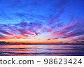 Sunset and sky on the horizon with Mt. Fuji in the distance 98623424