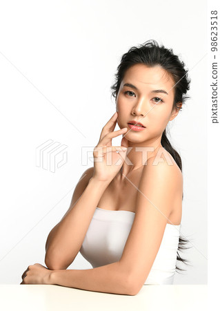 Beautiful young asian woman with clean fresh skin on white background, Face care, Facial treatment, Cosmetology, beauty and spa, Asian women portrait. Beautiful young asian woman with clean fresh skin on white background, Face care, Facial treatment, Cosmetology, beauty and spa, Asian women portrait. 98623518