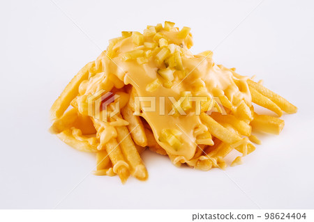 Pouring cheese sauce on french fries on white background 98624404