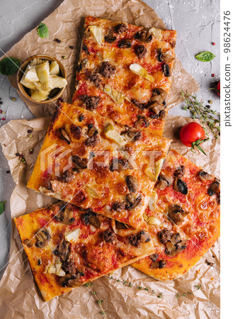 pizza with minced meat, artichokes and mushrooms pizza with minced meat, artichokes and mushrooms 98624476