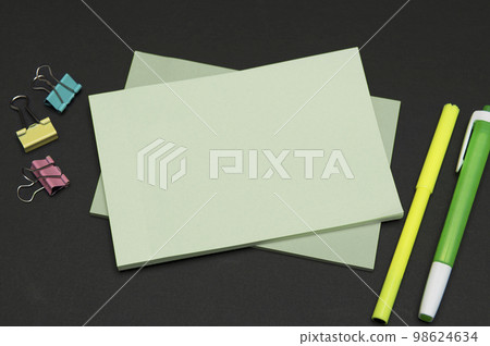 Different Office Supplies, Colored Stickers, Notebooks. Pens, Pencils, Rullers, Marckers. Different School Items. Important information. Accessories lying on desk. 98624634