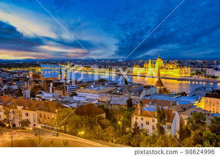 Budapest Hungary, city skyline night at Hungarian Parliament and Danube River Budapest Hungary, city skyline night at Hungarian Parliament and Danube River 98624996