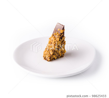 chocolate cake on white plate top view 98625433