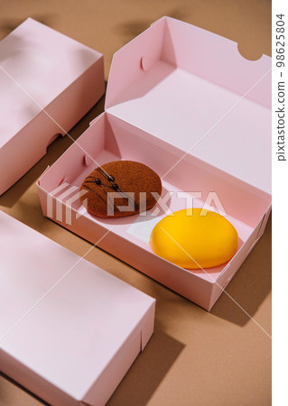 chocolate and lemon French mousse cake on box chocolate and lemon French mousse cake on box 98625804