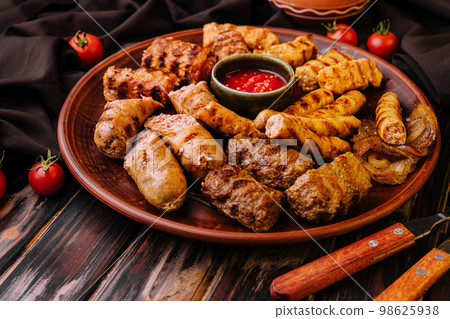 assorted barbecue of meat rolls or mici 98625938