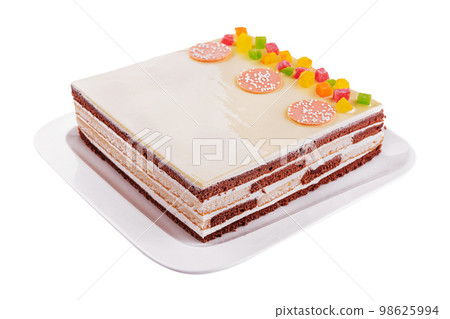 Delicious multilayer cocoa sponge cake with sugar mass 98625994