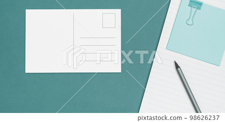 Photo With Pens Pencils Rullers Calculators. Notebook and Colored Paper Stickers Lying On White Desk. Multiple Assorted Collection Office Stationery. Postcards. Photo With Pens Pencils Rullers Calculators. Notebook and Colored Paper Stickers Lying On White Desk. Multiple Assorted Collection Office Stationery. Postcards. 98626237