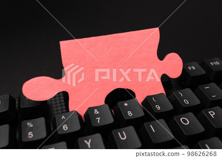 Colored sticker lying on black keyboard. Important information written over paper. Image with school supplies. Multiple Assorted Collection Office Stationery. Colored sticker lying on black keyboard. Important information written over paper. Image with school supplies. Multiple Assorted Collection Office Stationery. 98626268