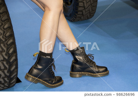 woman's feet in boots woman's feet in boots 98626696