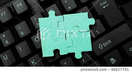 Colored sticker lying on black keyboard. Important information written over paper. Image with school supplies. Multiple Assorted Collection Office Stationery. 98627781