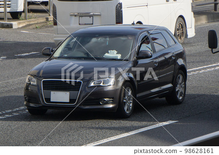 SUV utility vehicle road driving 98628161