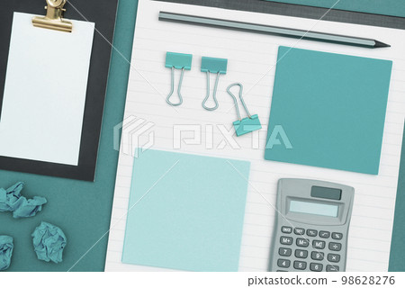 Photo With Pens Pencils Rullers Calculators. Notebook and Colored Paper Stickers Lying On White Desk. Multiple Assorted Collection Office Stationery. Postcards. 98628276