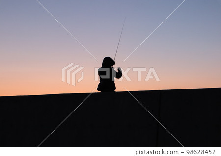 sea fishing fishing girl silhouette 98628452