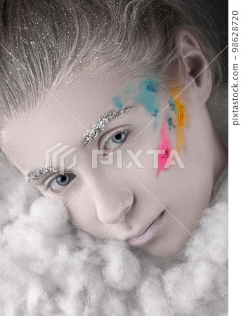 portrait of a beautiful girl with frozen makeup of Snow Queen, with ice and snow 98628720