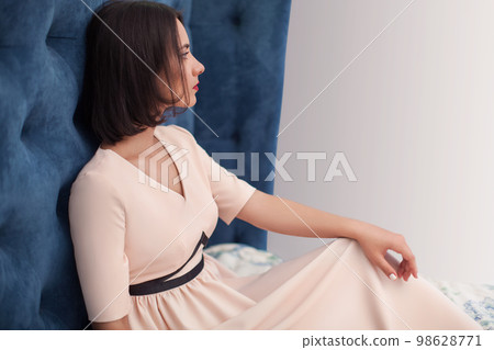 woman in beautiful classic stylish clothes in the interior. woman in beautiful classic stylish clothes in the interior. 98628771