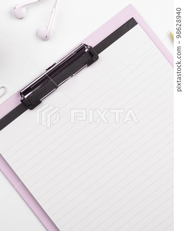 Different Office Supplies, Colored Stickers, Notebooks. Pens, Pencils, Rullers, Marckers. Different School Items. Important information. Accessories lying on desk. 98628940