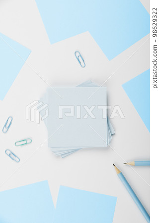 Multiple Assorted Collection Office Stationery Photo With Pens Pencils Notepads Notebook Ruler Stapler Scissors Clippers Paper Clips Holders Clipboard Placed Over Table. 98629322