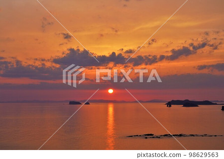 The sun setting over the sea from Roadside Station Yuhigaoka Sotome 98629563