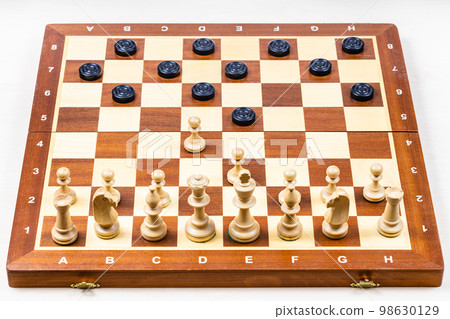 chessboard with first moves of chess and checkers chessboard with first moves of chess and checkers 98630129