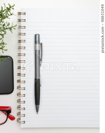 Notebook With Important Messages On Desk With Coffee, Phone And Pen. Crutial Informations Written On Pad On Table With Cup, Memos And Pencil. Late Updates Presented. 98631049