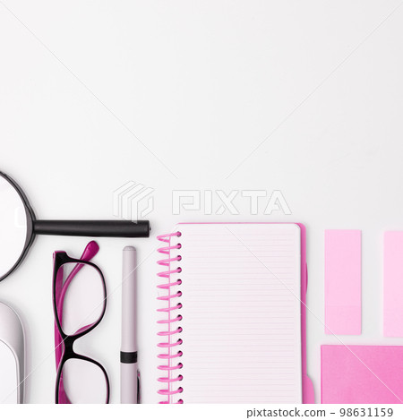 Office Supplies Over Desk With Keyboard And Glasses And Coffee Cup For Working Remotely, Assorted School Utilities For Studying With Hot Drink And Eyeglasses. Office Supplies Over Desk With Keyboard And Glasses And Coffee Cup For Working Remotely, Assorted School Utilities For Studying With Hot Drink And Eyeglasses. 98631159