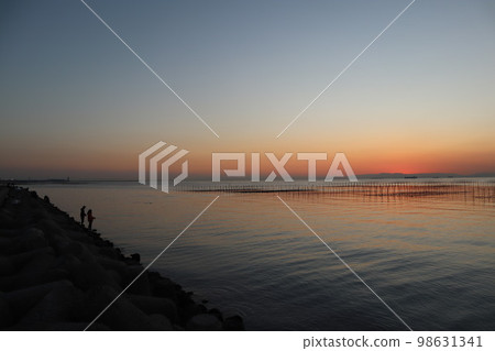 Sea coast Dusk Sunset Fishing Sea fishing 98631341