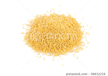 Dry millet isolated on white Dry millet isolated on white 98632258