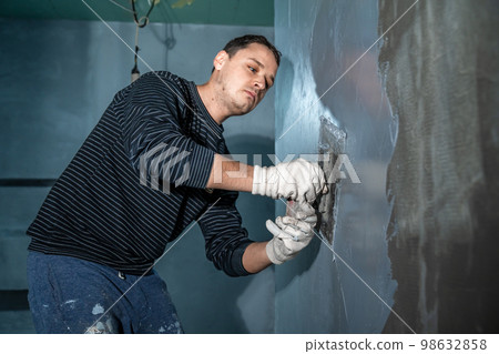 application of insulation to the wall against moisture and water application of insulation to the wall against moisture and water 98632858