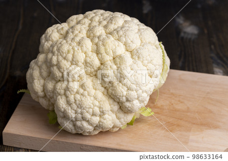 Cauliflower close up during cooking, fresh raw cauliflower Cauliflower close up during cooking, fresh raw cauliflower 98633164