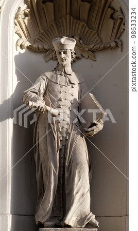Saint John Sarkander on the portal of Parish Church of the Holy Blood in Graz, Styria, Austria Saint John Sarkander on the portal of Parish Church of the Holy Blood in Graz, Styria, Austria 98633234