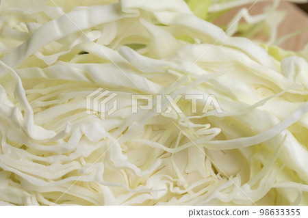 Sliced white cabbage on the table Sliced white cabbage on the table 98633355