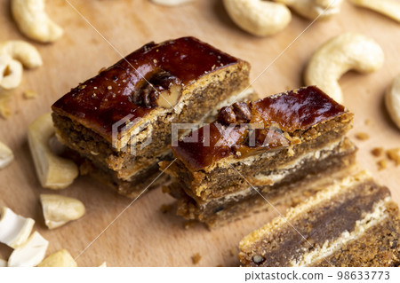 A piece of fresh and soft baklava 98633773