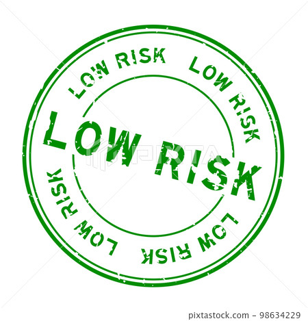 Grunge green low risk word round rubber seal stamp on white background 98634229