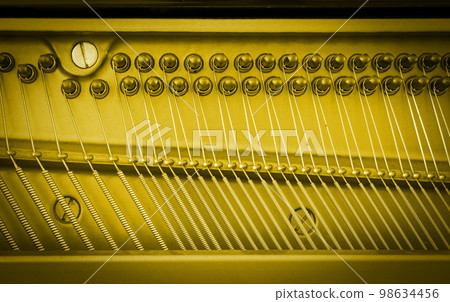 Details of piano mechanism gavel - string, pins and hammers Details of piano mechanism gavel - string, pins and hammers 98634456