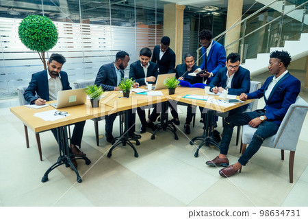 young business group have a meeting in modern eco office.travel insurance concept young business group have a meeting in modern eco office.travel insurance concept 98634731