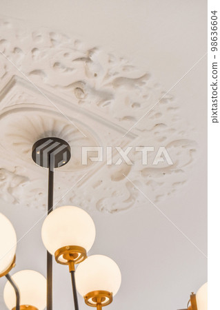 a chandel hanging on the ceiling in a room with... - Stock Photo [98636604]  - PIXTA