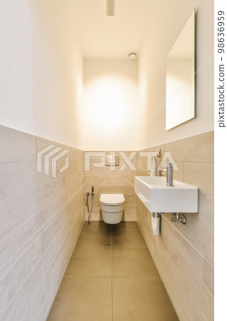 a bathroom with a toilet, sink and mirror on the wall next to each other items in the photo is blurry a bathroom with a toilet, sink and mirror on the wall next to each other items in the photo is blurry 98636959