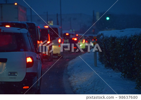 snowy night road snowy night road 98637680
