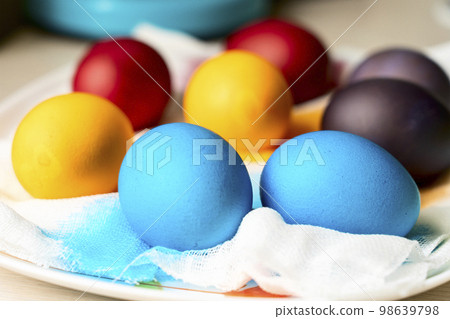 Painted eggs on the table after painting, a symbol of Easter, eggs Painted eggs on the table after painting, a symbol of Easter, eggs 98639798