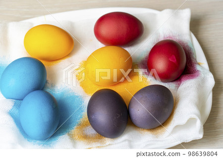 Painted eggs on the table after painting, a symbol of Easter, eggs Painted eggs on the table after painting, a symbol of Easter, eggs 98639804