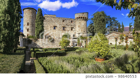 Italy, Toscana landscape. Scenic vineyards of Tuscany. view of medieval castle - Castello di Meleto in Chianti region. Italy, Toscana scenery Italy, Toscana landscape. Scenic vineyards of Tuscany. view of medieval castle - Castello di Meleto in Chianti region. Italy, Toscana scenery 98640553