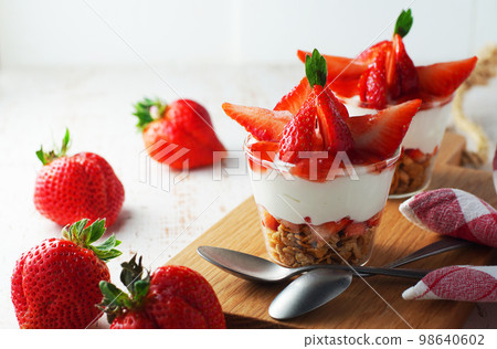 Yogurt Parfait with Plenty of Strawberries Yogurt Parfait with Plenty of Strawberries 98640602