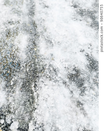 A sidewalk that has become an ice barn A sidewalk that has become an ice barn 98640755