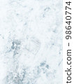 Snow footprints after many people walking 98640774
