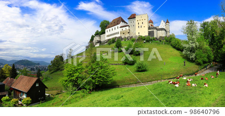 Scenic Swiss landscape with medieval castles and green pastures. Lenzburg , Switzerland Scenic Swiss landscape with medieval castles and green pastures. Lenzburg , Switzerland 98640796